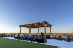 Rooftop grill and seating.