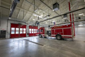 Firetruck in vehicle bay.