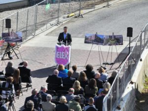 Speaking during event.