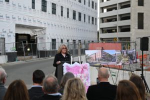 Making remarks to the crowd.