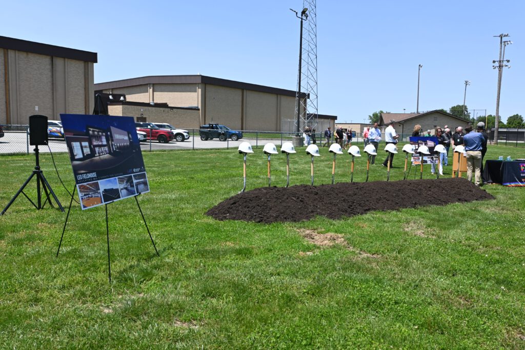 Leo Fieldhouse Groundbreaking | Weigand Construction Dirt and Posters