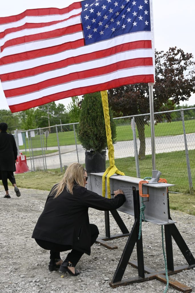 Paul Harding Steel Topping | Weigand Construction Beam Signing 1